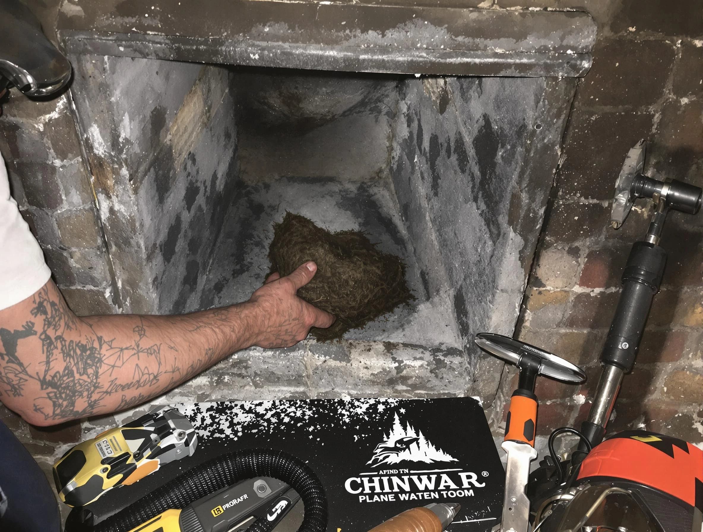 North Plainfield Chimney Sweep safely removing debris and screening chimney in North Plainfield, NJ